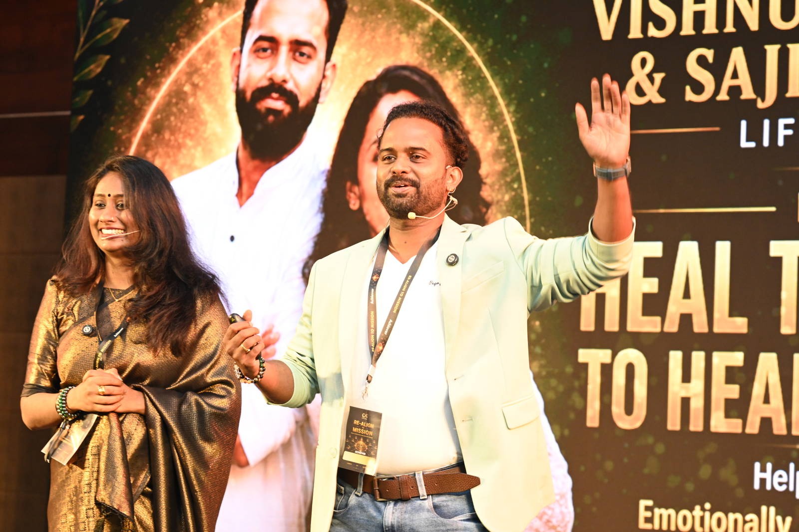 Vishnu Chakrapani and Sajitha Vishnu on stage